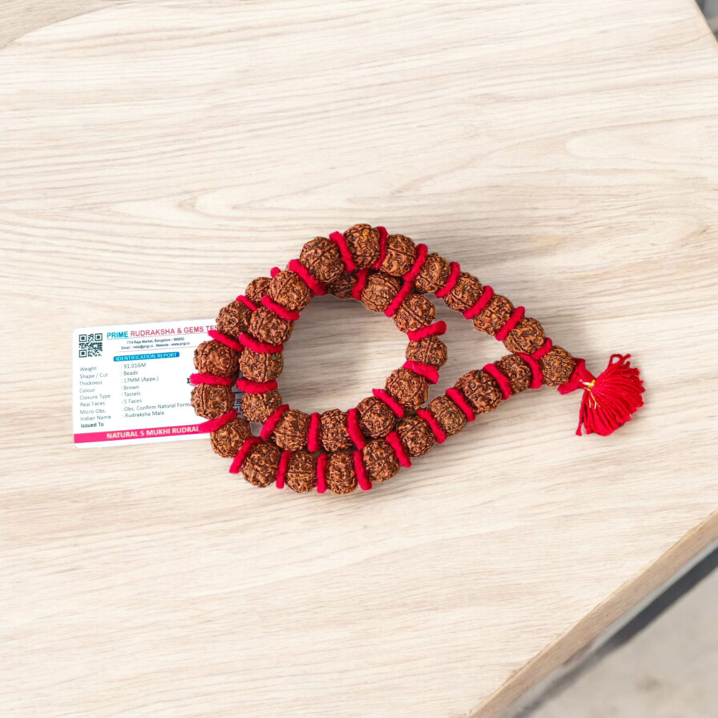 A spiritual combo featuring a red velvet Kantha Mala made with 5 Mukhi Rudraksha beads and a silver-capped 3 Mukhi Rudraksha pendant, both lab certified