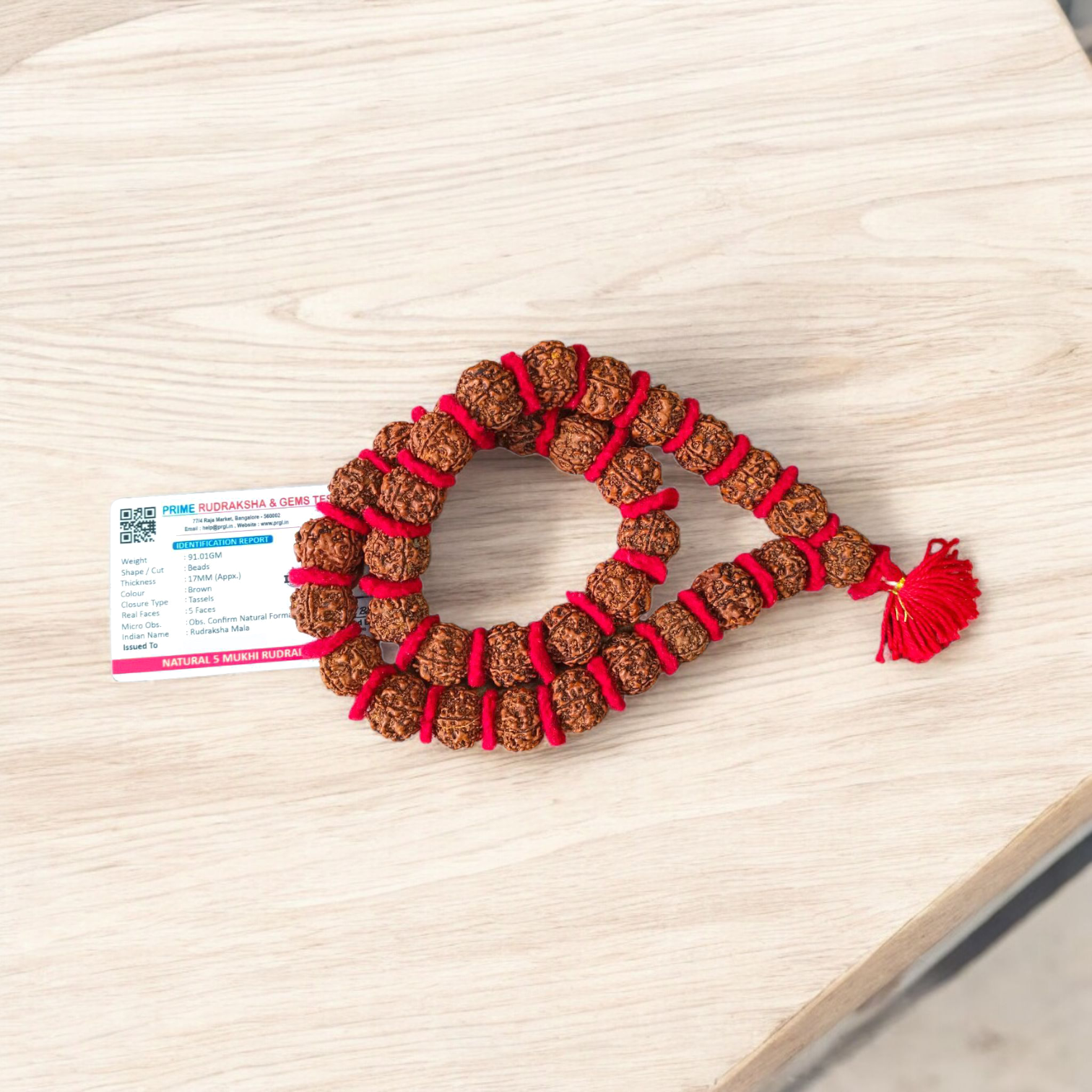 A spiritual combo featuring a red velvet Kantha Mala made with 5 Mukhi Rudraksha beads and a silver-capped 3 Mukhi Rudraksha pendant, both lab certified