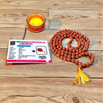 A spiritual combo of Sphatik Mala and Rudraksha Mala placed together, showing the clear quartz beads and brown Rudraksha seeds in detailed view