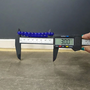 A stretchable Blue Onyx bracelet made of 8mm round beads, arranged neatly in a circular form on a clean white background