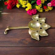 A traditional Panch Mukhi Jyot made of pure brass, featuring five oil chambers, intricately handcrafted for spiritual rituals and puja use