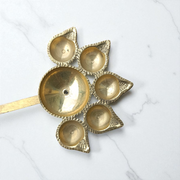 A traditional Panch Mukhi Jyot made of pure brass, featuring five oil chambers, intricately handcrafted for spiritual rituals and puja use