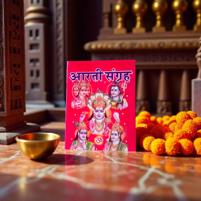 Aarti Sangrah Book in Hindi with traditional cover art, placed beside diya and idol in a temple setting