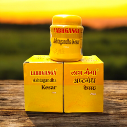 Ashtaganda kesar kumkum containers placed with puja items like diya, flowers, and yantra paper