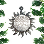 Ashtbhairav Yantra with gold finish and black thread for hanging, displayed against a white background