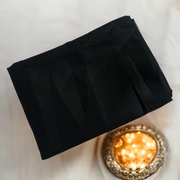 Black cotton pooja cloth (1.25 meter) neatly folded, ideal for spiritual rituals and deity worship