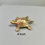Brass Kachua Yantra – turtle-shaped vastu item with sacred yantra inscriptions, used for positive energy and wish fulfilment.
