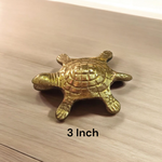 Brass Kachua Yantra – turtle-shaped vastu item with sacred yantra inscriptions, used for positive energy and wish fulfilment.