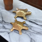 Brass Kachua Yantra – turtle-shaped vastu item with sacred yantra inscriptions, used for positive energy and wish fulfilment.