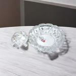 Clear crystal tortoise on round crystal plate, symbolizing Feng Shui stability and prosperity