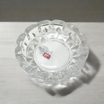 Clear crystal tortoise on round crystal plate, symbolizing Feng Shui stability and prosperity