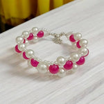 Close-up image of Natural Pink Agate Pearl Bracelet with 8MM Hakik beads on a white background

