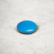 Close-up image of an Original Turquoise (Firoza) Stone with smooth polish and natural color patterns, ideal for healing and confidence