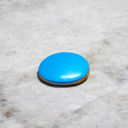 Close-up image of an Original Turquoise (Firoza) Stone with smooth polish and natural color patterns, ideal for healing and confidence