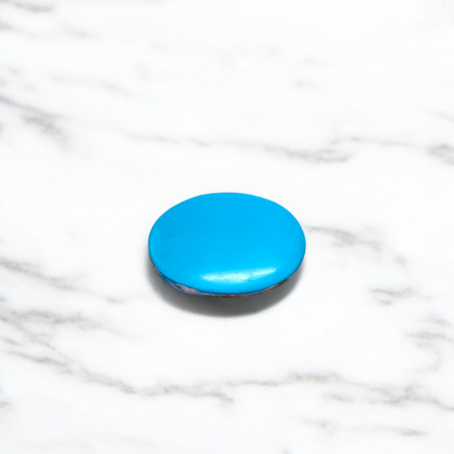 Close-up image of an Original Turquoise (Firoza) Stone with smooth polish and natural color patterns, ideal for healing and confidence
