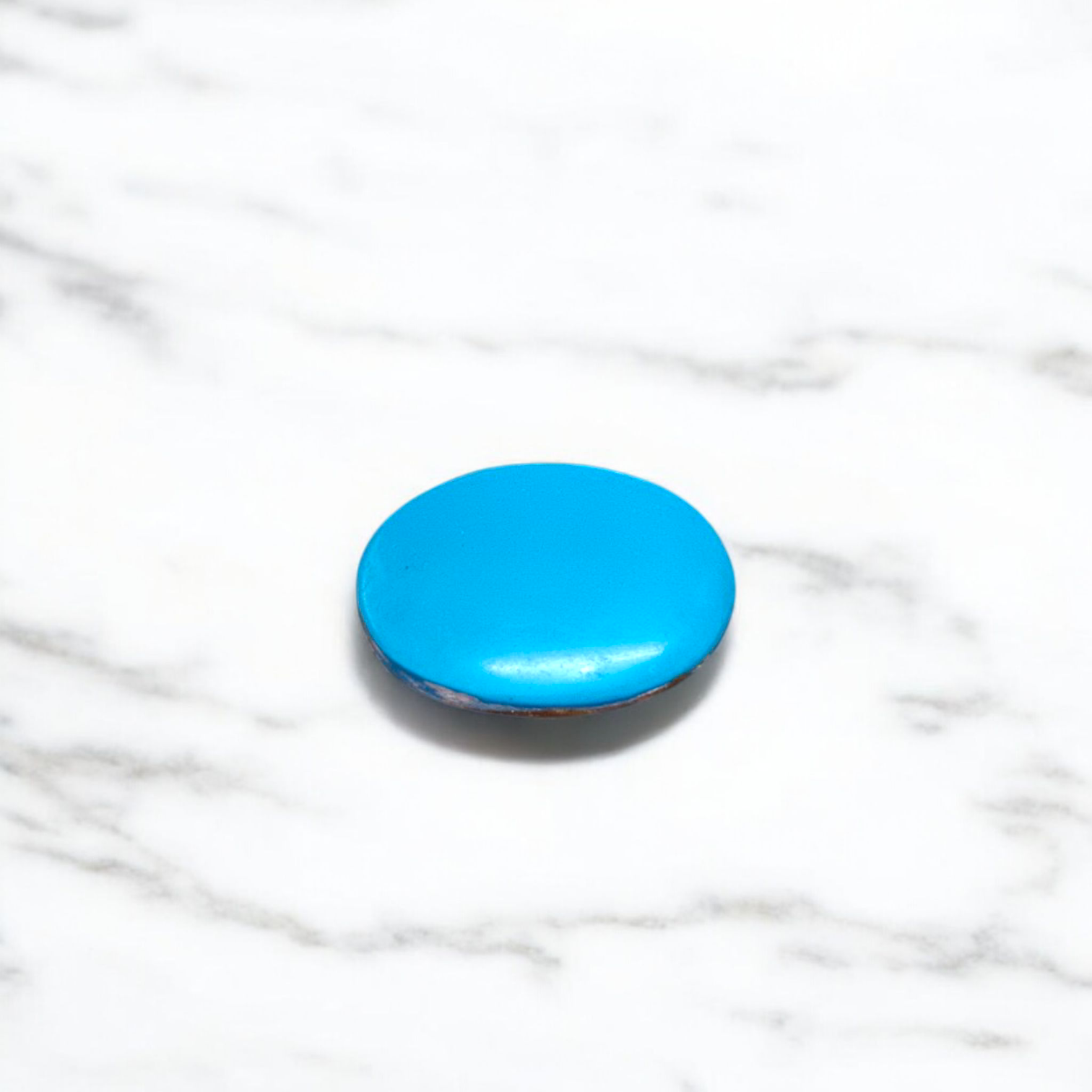 Close-up image of an Original Turquoise (Firoza) Stone with smooth polish and natural color patterns, ideal for healing and confidence