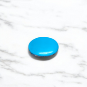 Close-up image of an Original Turquoise (Firoza) Stone with smooth polish and natural color patterns, ideal for healing and confidence