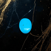 Close-up image of an Original Turquoise (Firoza) Stone with smooth polish and natural color patterns, ideal for healing and confidence