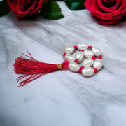 Close-up of MALAWALA Natural Pearl Finger Mala with 9+1 round 10–11mm pearls, ideal for meditation, japa, and daily spiritual use