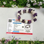 Close-up of Natural Amethyst and White Agate bracelet with polished beads for meditation and healing