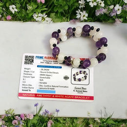 Close-up of Natural Amethyst and White Agate bracelet with polished beads for meditation and healing