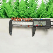 Close-up of Natural Gomed (Hessonite) 8MM bracelet with polished beads on elastic string