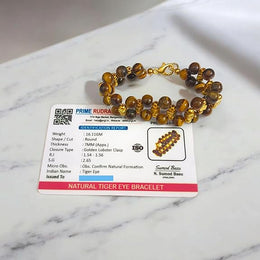Close-up of Natural Tiger Eye Bracelet with polished 7MM beads on elastic band
