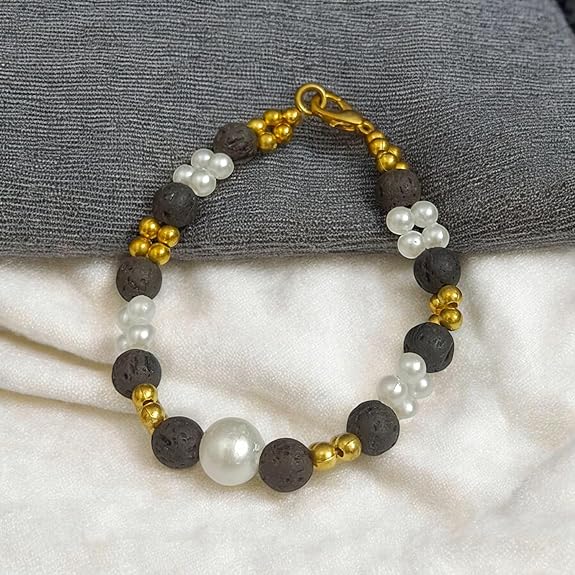 Close-up of a handcrafted lava bracelet featuring genuine lab-certified black lava beads on an elastic cord