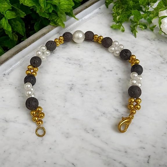Close-up of a handcrafted lava bracelet featuring genuine lab-certified black lava beads on an elastic cord