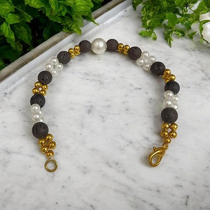 Close-up of a handcrafted lava bracelet featuring genuine lab-certified black lava beads on an elastic cord