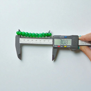 Close-up of stretchable Green Onyx Bracelet with 8mm polished beads, designed by MALAWALA