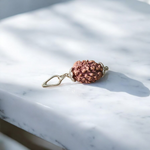 Combo pendant featuring 1 Mukhi and 3 Mukhi Rudraksha beads, lab certified, set in a sleek metal cap design for spiritual use