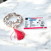 Combo set of Crystal (Sphatik) Mala and Vaijanti Mala placed on a sacred cloth, highlighting their beads and craftsmanship