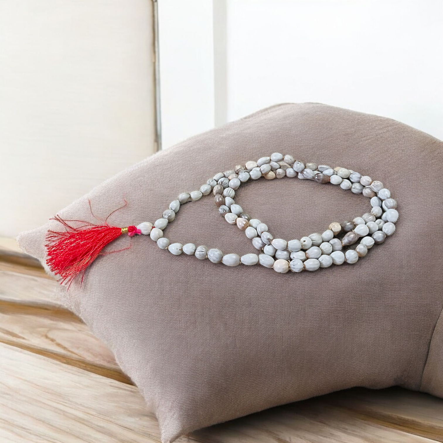 Combo set of Crystal (Sphatik) Mala and Vaijanti Mala placed on a sacred cloth, highlighting their beads and craftsmanship