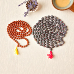 Combo set of Kamal Gutta Mala and Rudraksha Mala with 108+1 beads each, used for mantra chanting, meditation, and spiritual rituals