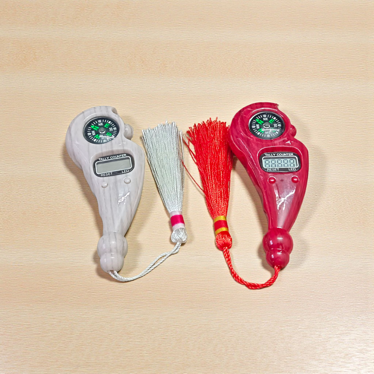 Compact digital finger counter with LED display and finger strap, ideal for prayer, japa, or tasbih counting