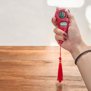 Compact digital finger counter with LED display and finger strap, ideal for prayer, japa, or tasbih counting