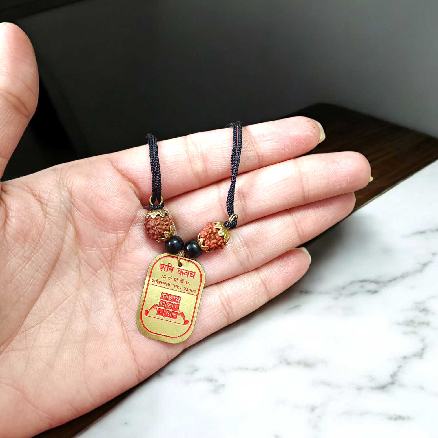 Divya Shani Dosh Nivaran Kawach pendant with Panchdhatu metal and Rudraksha, energized and lab-certified for protection and peace