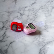 Electronic finger mantra counter with adjustable strap and digital display, suitable for pooja and meditation use