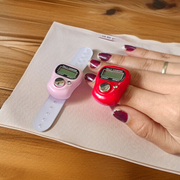 Electronic finger mantra counter with adjustable strap and digital display, suitable for pooja and meditation use