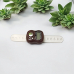 Electronic finger mantra counter with adjustable strap and digital display, suitable for pooja and meditation use