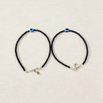 Elegant anklet with blue evil eye charm for girls and women, featuring adjustable chain and delicate bead detailing, designed for protection and style