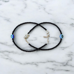Elegant anklet with blue evil eye charm for girls and women, featuring adjustable chain and delicate bead detailing, designed for protection and style