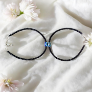 Elegant anklet with blue evil eye charm for girls and women, featuring adjustable chain and delicate bead detailing, designed for protection and style