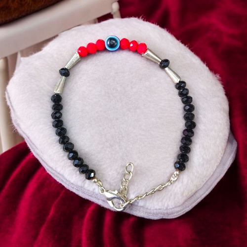 Evil Eye Anklet for Kids featuring black and red beads with stretchable design, ideal for daily wear and spiritual protection
