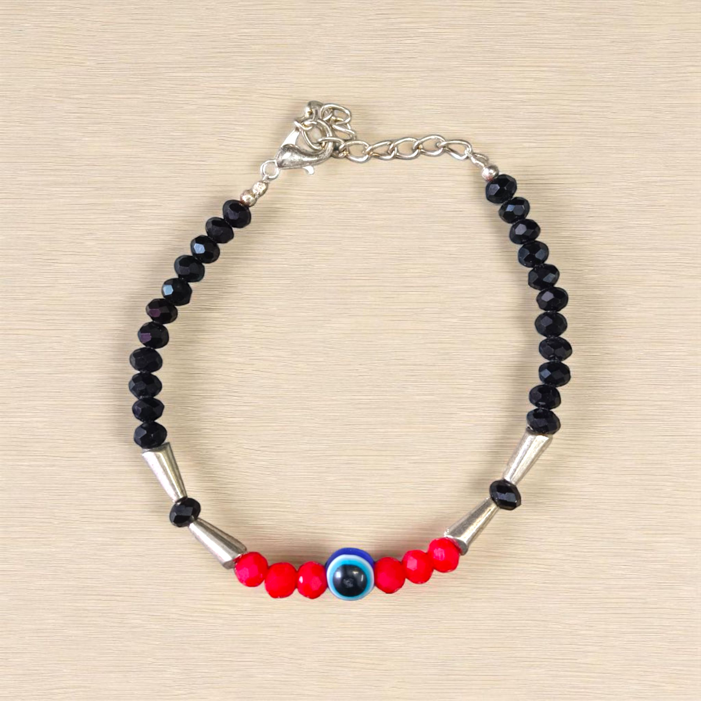 Evil Eye Anklet for Kids featuring black and red beads with stretchable design, ideal for daily wear and spiritual protection