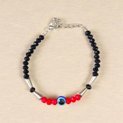 Evil Eye Anklet for Kids featuring black and red beads with stretchable design, ideal for daily wear and spiritual protection
