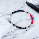 Evil Eye Anklet for Kids featuring black and red beads with stretchable design, ideal for daily wear and spiritual protection