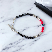 Evil Eye Anklet for Kids featuring black and red beads with stretchable design, ideal for daily wear and spiritual protection