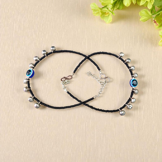 Fancy evil eye anklet for girls with adjustable chain, featuring blue enamel charm and beadwork, ideal for daily wear or special occasions